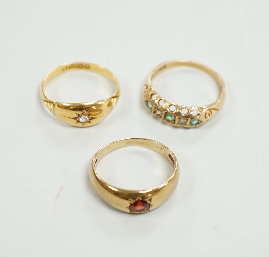 An Edwardian 18ct gold and diamond chip set ring, size M, gross weight 2.6 grams and two later 9ct gold and gem set rings, gross weight 5.5 grams.
